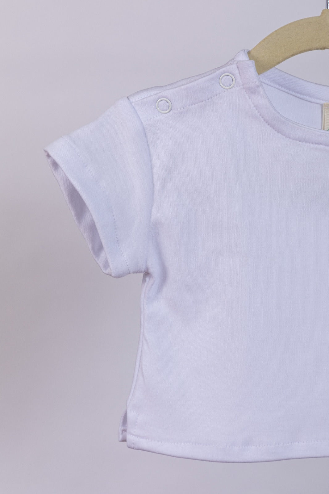 Camiseta broches hombro