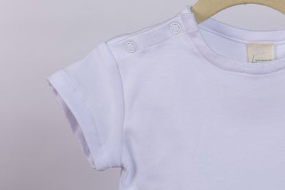 Camiseta broches hombro